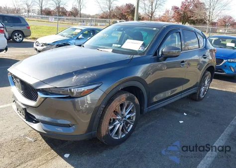 2019 Mazda Cx-5 Grand Touring z USA, uszkodzony, nr VIN JM3KFBDM5K0589945